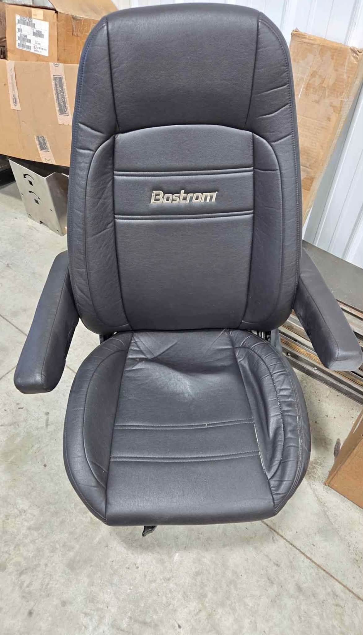 Bostrom black air ride seat, Bostrom truck seat, used air ride truck seat, black semi truck seat, air suspension truck seat, heavy duty truck seat, replacement truck seat, semi truck interior parts, used Bostrom seat, commercial truck seat