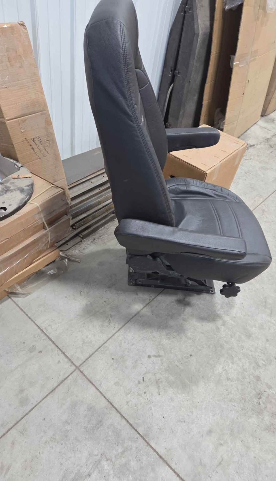 Bostrom black air ride seat, Bostrom truck seat, used air ride truck seat, black semi truck seat, air suspension truck seat, heavy duty truck seat, replacement truck seat, semi truck interior parts, used Bostrom seat, commercial truck seat