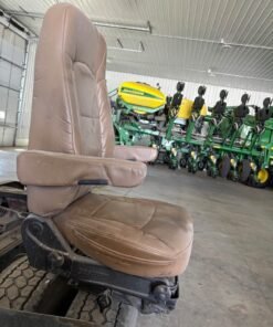 Bostrom Wide Ride seat, Bostrom air ride seat, Bostrom truck seat, Bostrom Wide Ride air seat, tan leather truck seat, truck air ride seat, used Bostrom seat, Bostrom seat for sale, used truck seat, replacement truck seat, semi truck air ride seat, heavy duty truck seat, commercial truck seat, Bostrom Wide Ride replacement seat, tan truck seat, air suspension truck seat.
