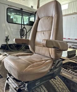 Bostrom Wide Ride seat, Bostrom air ride seat, Bostrom truck seat, Bostrom Wide Ride air seat, tan leather truck seat, truck air ride seat, used Bostrom seat, Bostrom seat for sale, used truck seat, replacement truck seat, semi truck air ride seat, heavy duty truck seat, commercial truck seat, Bostrom Wide Ride replacement seat, tan truck seat, air suspension truck seat.